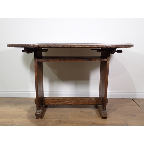 694 - A 17th Century oak Monks Bench, with adjustable oval top 4ft 4in W x 2ft 6in H