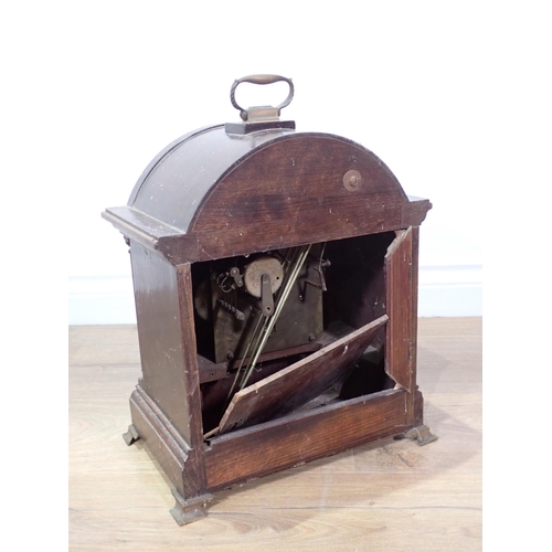 694A - A mahogany cased Bracket Clock with silvered dial, chime silent dial and fast, slow dial A/F 1ft 2in... 