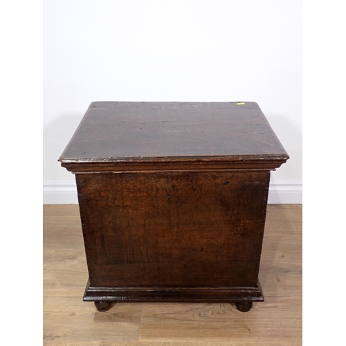 695 - An antique oak Box with moulded hinged lid mounted on bun feet 1ft 9in W x 1ft 8in H