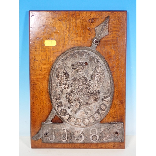 699 - Three antique leaf Fire Service Plaques on oak shields