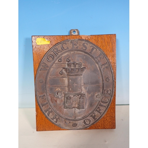 699 - Three antique leaf Fire Service Plaques on oak shields