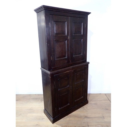 710 - An antique oak Shallow Cupboard fitted four doors 5ft 11in H x 3ft 1in W