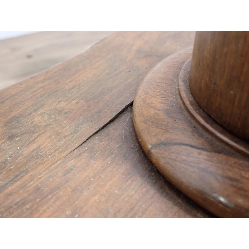 731 - A Victorian rosewood Work Table on turned column and quadruple base 2ft 4in H x 1ft 5in W