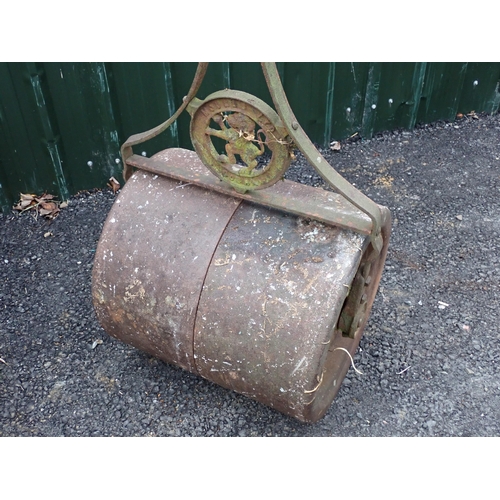 745 - A large Victorian Garden Roll and a brass single Bed