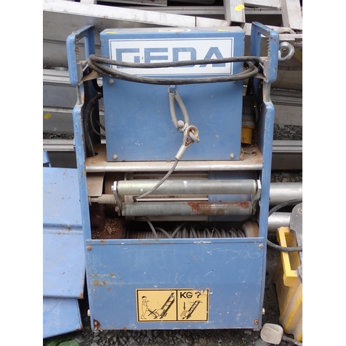 746 - A GEDA Brick Hoist with Winch, with Controls and Transformer.