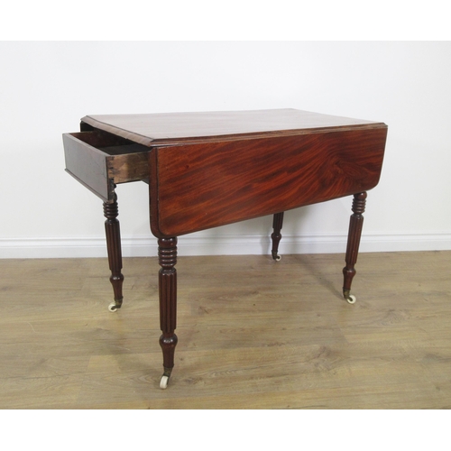 75 - A 19th Century mahogany Pembroke Table on fluted supports and ceramic casters 2ft 11in W x 2ft 4in H