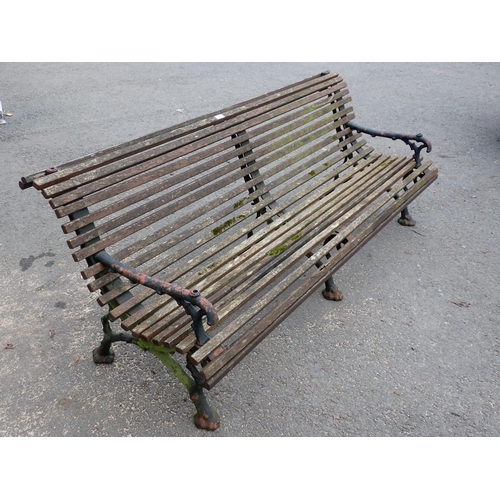 750 - A Coalbrookdale style Bench with cast iron branch effect supports and wooden slats 6ft 7in W