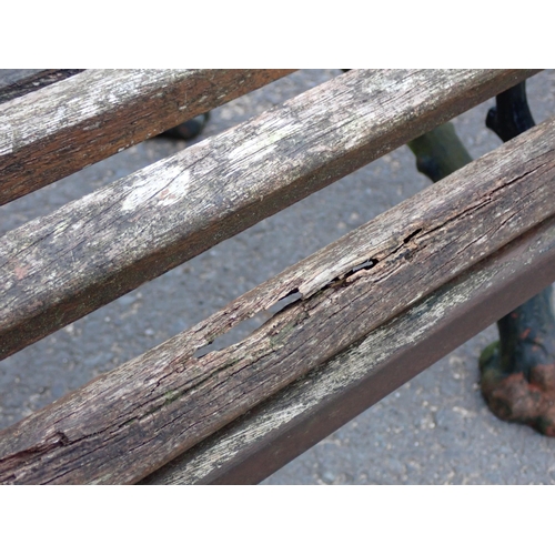 750 - A Coalbrookdale style Bench with cast iron branch effect supports and wooden slats 6ft 7in W