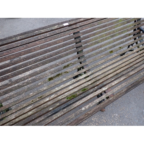 750 - A Coalbrookdale style Bench with cast iron branch effect supports and wooden slats 6ft 7in W