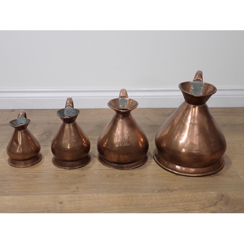 87 - A Victorian graduated set of four copper measuring Jugs