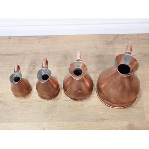 87 - A Victorian graduated set of four copper measuring Jugs