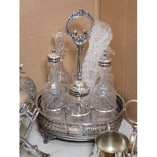 502 - An engine turned silver Dressing Table Set, a plated Condiment Set on stand, an embossed Tray, a pla... 