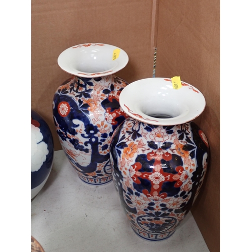 515 - A pair of Imari baluster Vases, two Chinese lidded blue and white Vases, a baluster Vase, two cylind... 