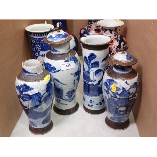 515 - A pair of Imari baluster Vases, two Chinese lidded blue and white Vases, a baluster Vase, two cylind... 