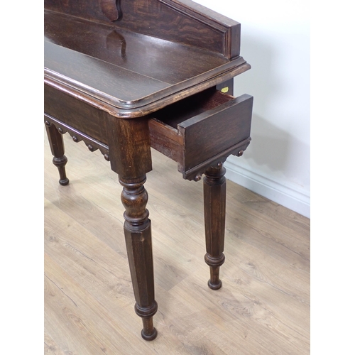 54 - A Victorian oak Hall Table mounted upon octagonal tapering supports 3ft 6in W x 3ft 3in H