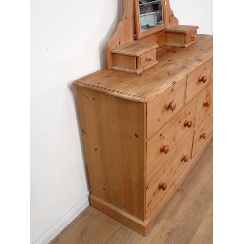 578 - A modern pine Dressing Chest fitted seven drawers on shaped base 5ft 2in H x 4ft 8in W