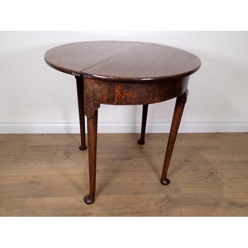 588 - An 18th Century and later mahogany dropleaf demi-lune Table on pad feet 2ft 6in W x 2ft 2in H