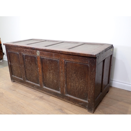 598 - An 18th Century oak plain four panel Coffer initialled and dated 'M.D. 1715' 4ft 6in W x 2ft H