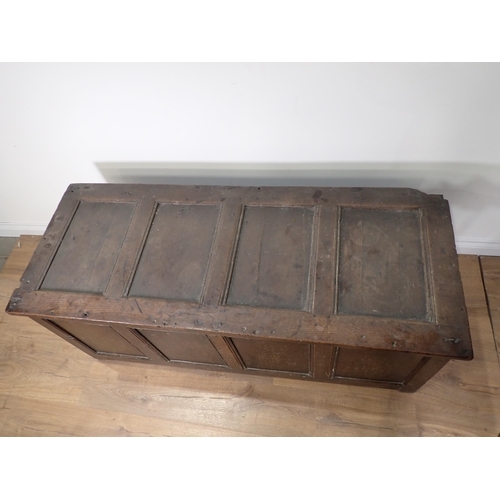 598 - An 18th Century oak plain four panel Coffer initialled and dated 'M.D. 1715' 4ft 6in W x 2ft H