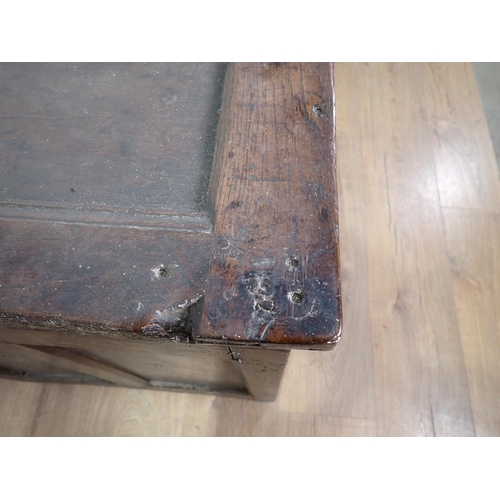 598 - An 18th Century oak plain four panel Coffer initialled and dated 'M.D. 1715' 4ft 6in W x 2ft H