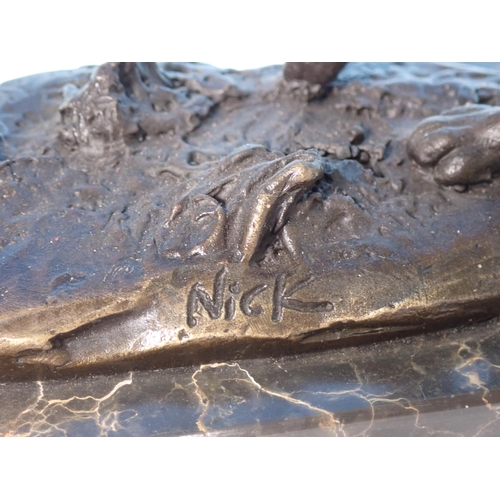 6 - A bronze Sculpture of boxing hares on green polished stone base, signed 'Nick' 9 1/2in H