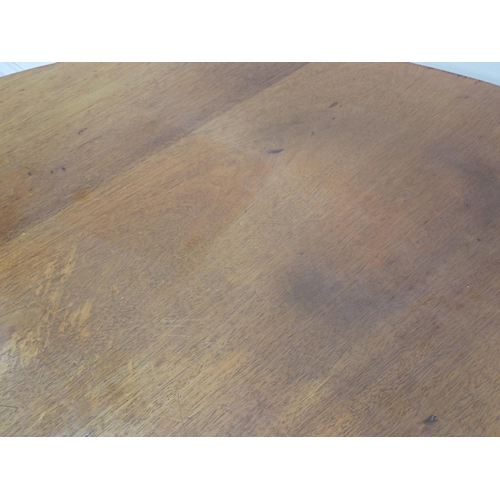 606 - A Victorian circular walnut Breakfast Table on carved tripod base 3ft 10in D x 2ft 4in H