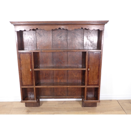 61 - An antique oak Dresser Rack 4ft 4in H x 4ft W and a bamboo open Bookcase 3ft 11in H x 2ft 2in W