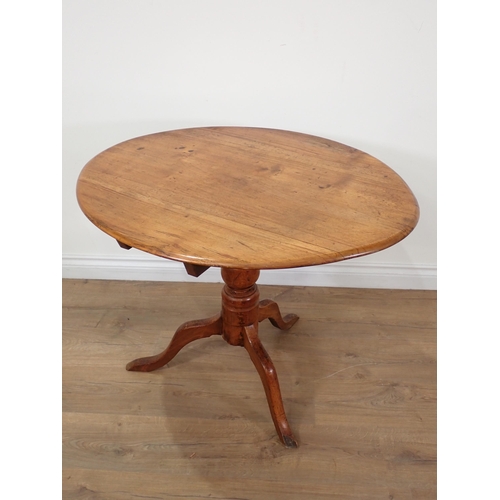 610 - A 19th Century Pillar Table with circular tilt top on oak tripod base 2ft 11in D x 2ft 3in H