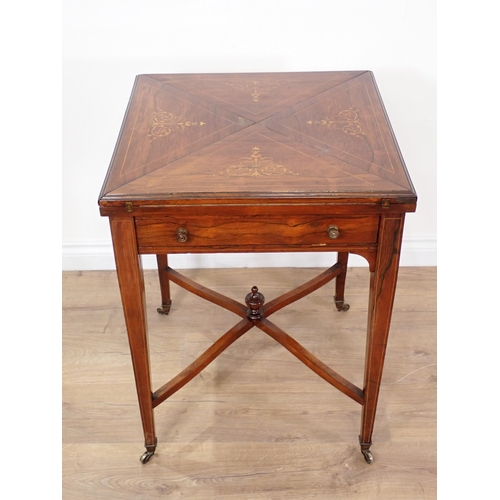 611 - A Victorian rosewood and inlaid Envelope Card Table fitted with single drawer mounted upon square cu... 