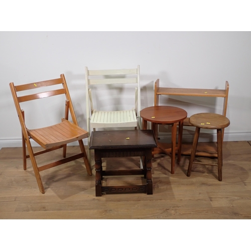 64 - An oak Joint Stool, an ash Stool, folding Occasional Table, open Bookcase and two folding Chairs