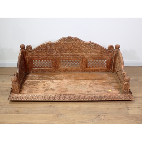 69 - An Indian hardwood hanging Swing Bench with carved and pierced decoration 4ft 9in W x 1ft 10in H