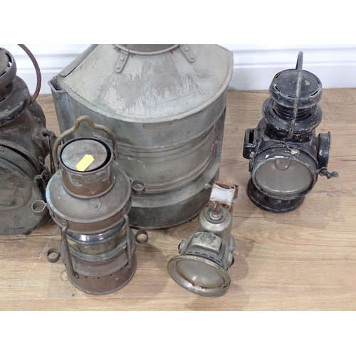 74 - A Ship's Lantern, two Railway Lamps, an 'Anchor' Lamp and a Bike Lamp and an upholstered Stool/Lugga... 