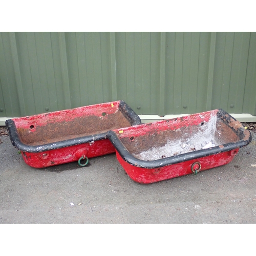 748 - A pair of antique cast iron black painted Troughs