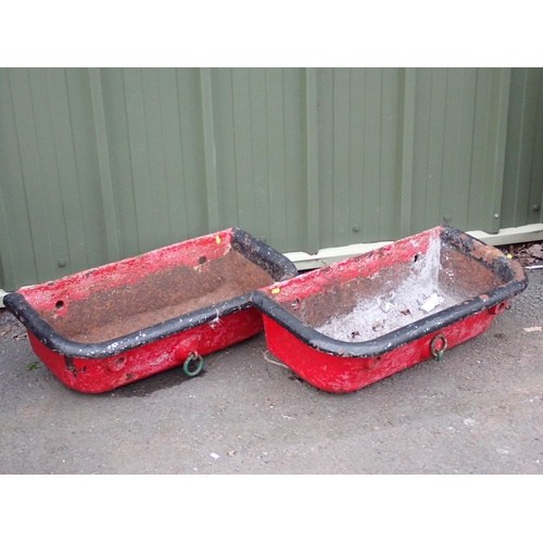 748 - A pair of antique cast iron black painted Troughs