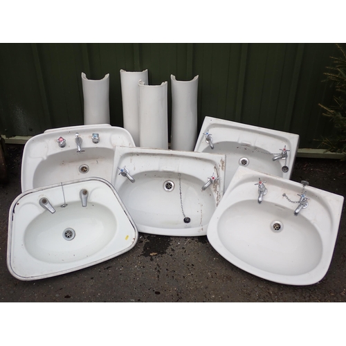 750 - Four ceramic pedestal bathroom Sinks