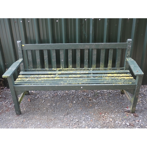 762 - A green painted wooden Garden Bench