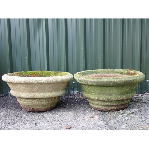 768 - A near pair of concrete Planters