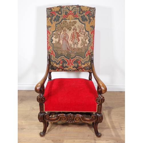 82 - A Charles II style oak framed high backed Armchair with needlework back and red cushioned seat 4ft H... 