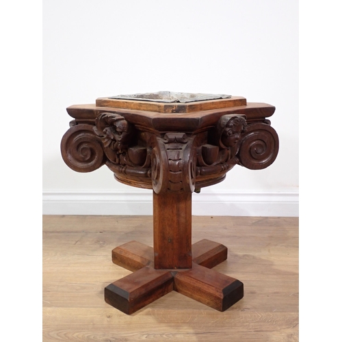 91 - A Victorian Gothic revival oak Plant Stand with carved mask and scroll decoration 1ft 7in W x 1ft 5i... 