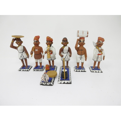 97 - A collection of approx 30 Indian wooden and painted Figures including Snake Charmer, etc, approx 3in