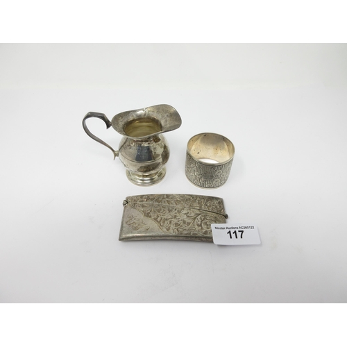 117 - An Edward VII Card Case, leafage scroll engraved, Chester 1906, small Cream Jug, Birmingham 1923 and... 