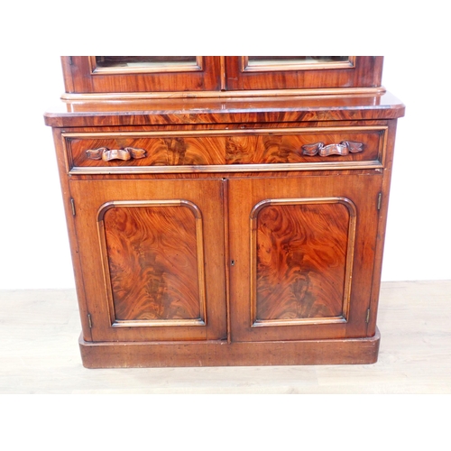 17 - A Victorian mahogany Bookcase with glazed upper section with mirrored back and glass shelves above b... 