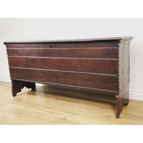 18 - A 17th Century oak six plank boarded Coffer with moulded plank lid above channel moulded front with ... 