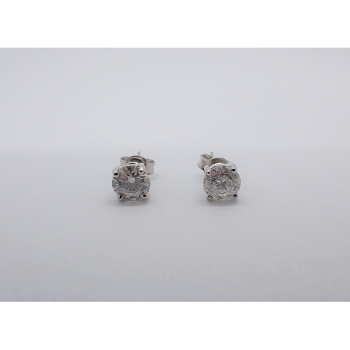 182 - A pair of Diamond Ear Studs each claw-set brilliant-cut stone, total diamond weight 2.00cts,  in 18c... 