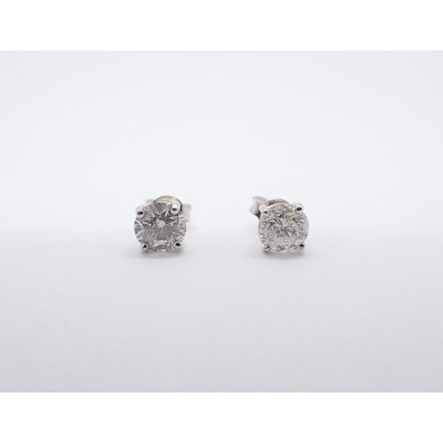 182 - A pair of Diamond Ear Studs each claw-set brilliant-cut stone, total diamond weight 2.00cts,  in 18c... 