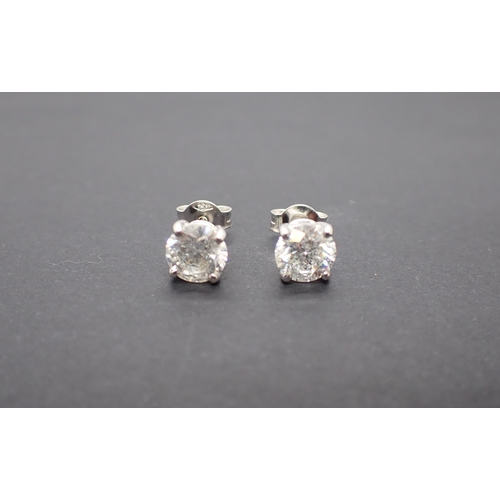 182 - A pair of Diamond Ear Studs each claw-set brilliant-cut stone, total diamond weight 2.00cts,  in 18c... 