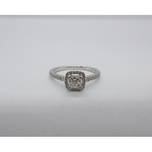 188 - A Diamond halo Cluster Ring corner claw-set square asscher-cut stone, 0.39cts, within a frame of bri... 