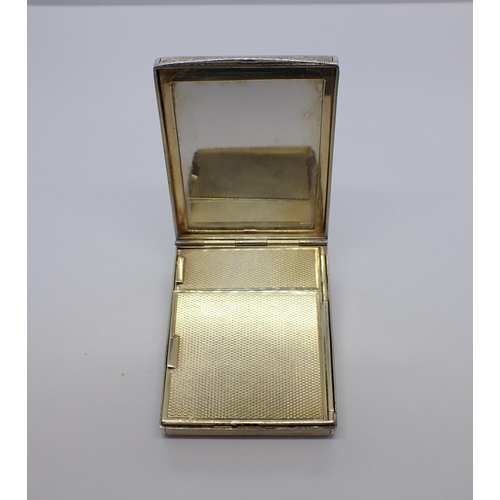 207 - A rectangular silver Compact with black and cream decoration to lid