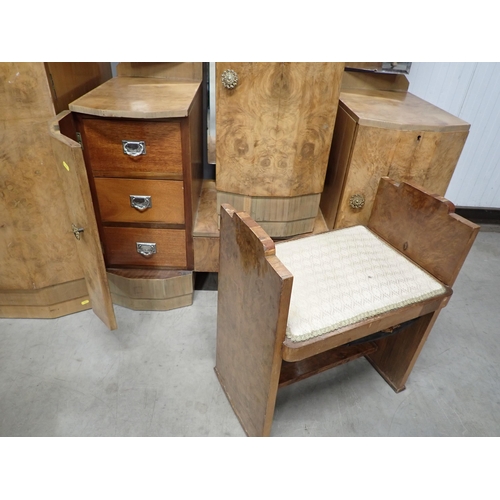 21 - An Art Deco walnut veneered Bedroom Suite of triple Wardrobe 6ft 3in H x 5ft 1in W, a Dressing Table... 