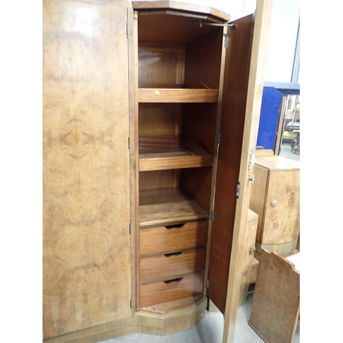 21 - An Art Deco walnut veneered Bedroom Suite of triple Wardrobe 6ft 3in H x 5ft 1in W, a Dressing Table... 